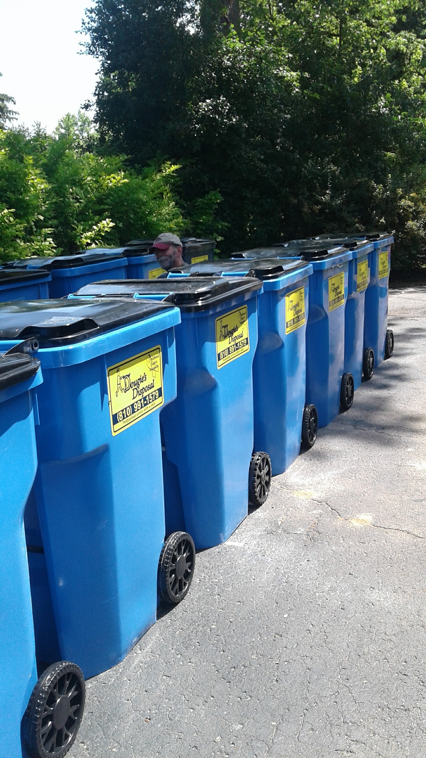 Clean residential trash bins after professional washing